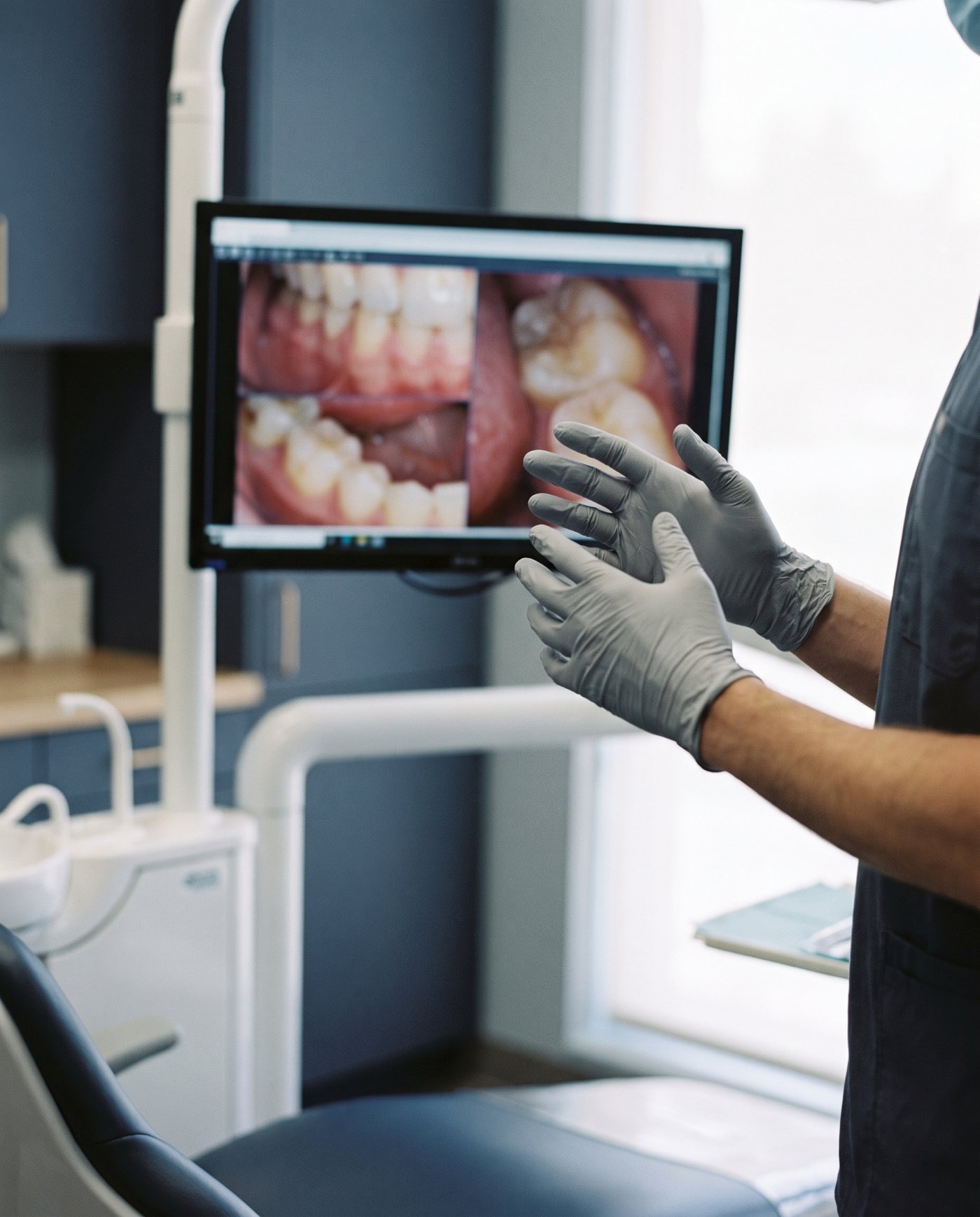 Chairside monitor showing patient photographs